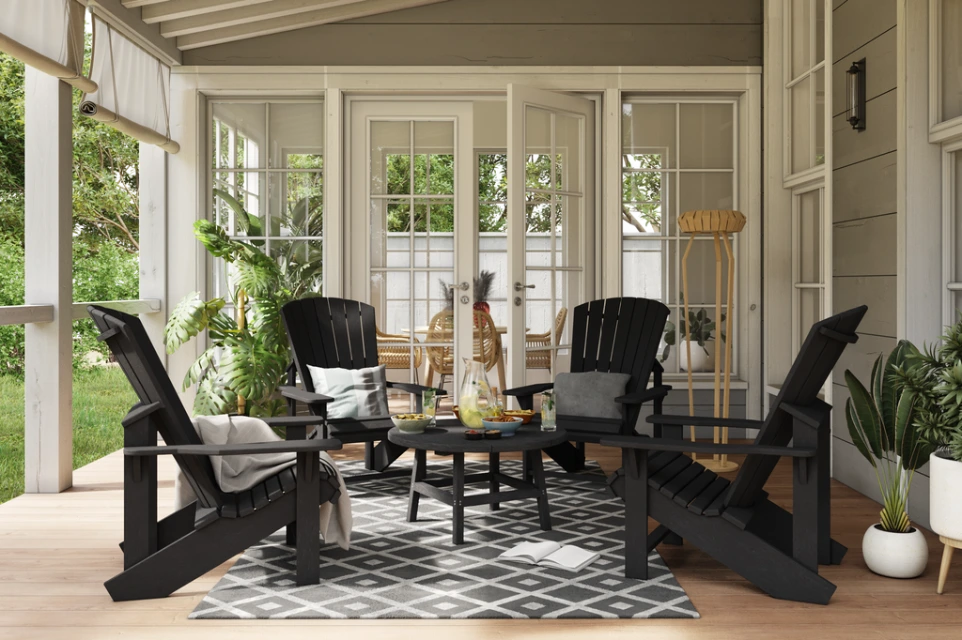 Covered porch with Black adirondack chairs
